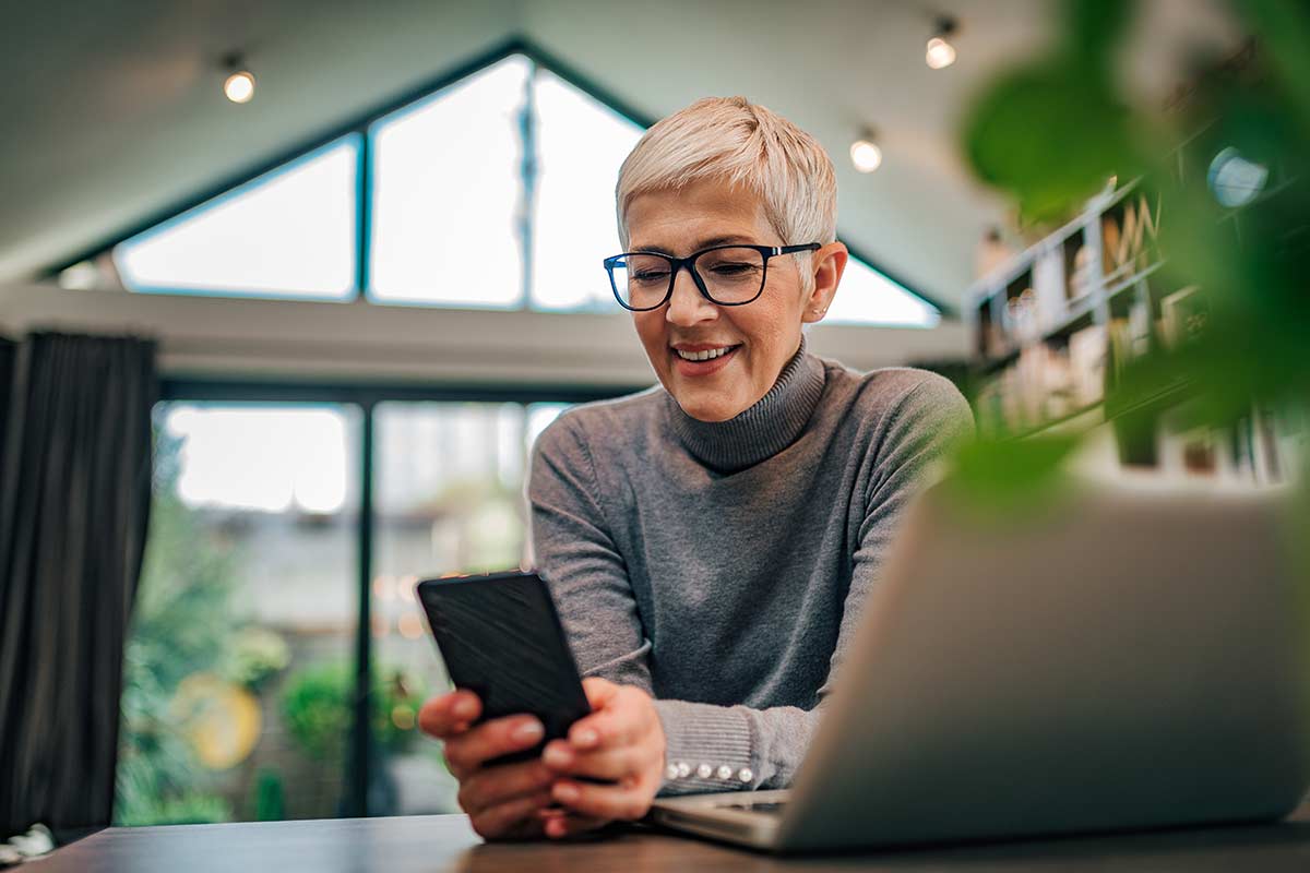 woman enjoying apps on her phone