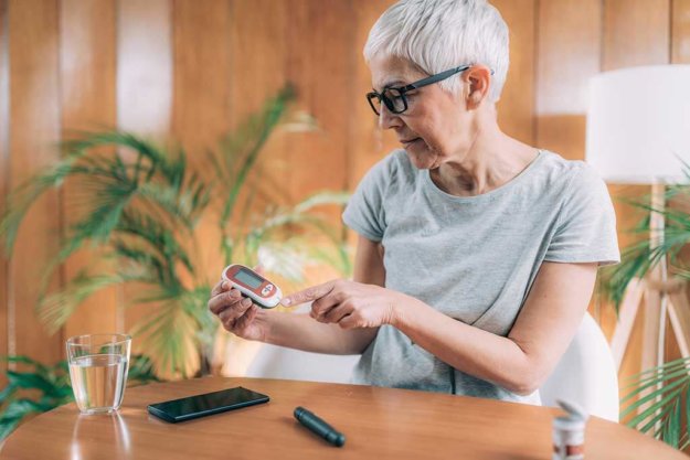 Diabetic Measuring Blood Glucose Levels Diabetes. Measuring Glucose Levels