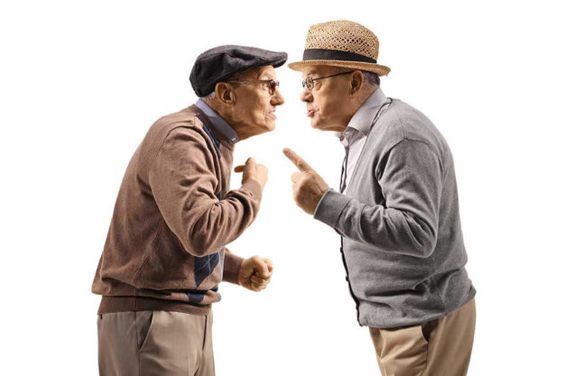 Seniors having an argument Seniors having an argument isolated