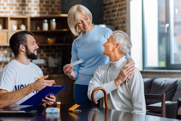 Cheerful smiling loving wife smiling while coming to her senior husband Cheerful smiling loving wife smiling while coming to her senior husband