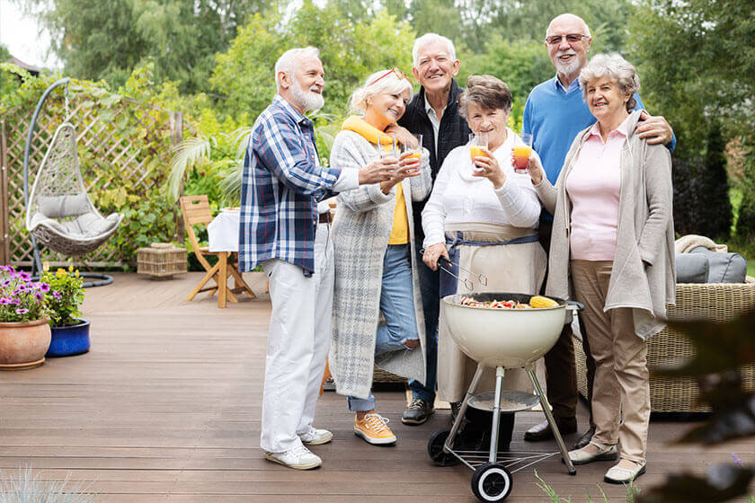 Group of happy senior people during garden party Group of happy senior people during garden party