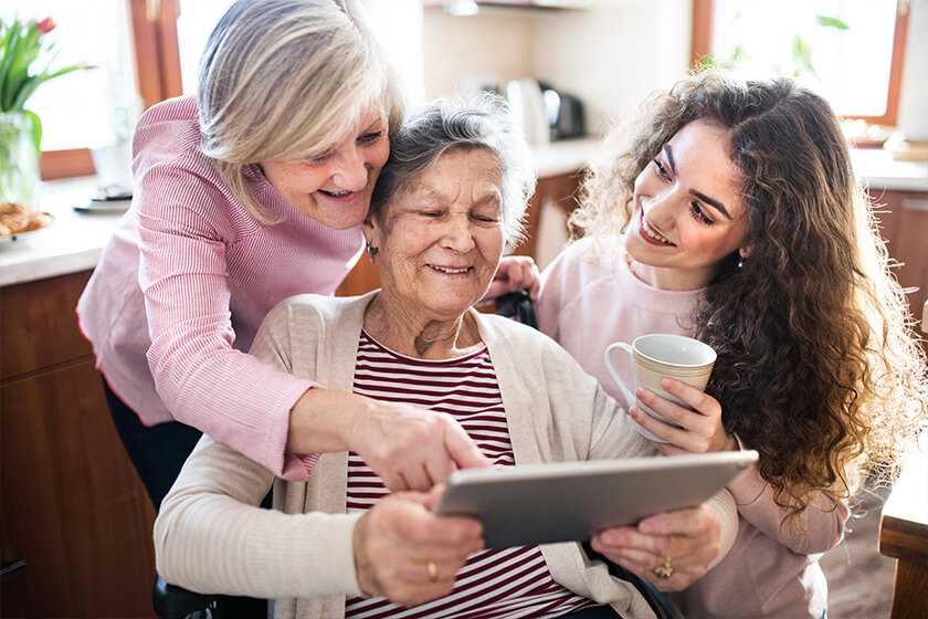 A teenage girl with mother and grandmother at home. A teenage girl with mother and grandmother at home.