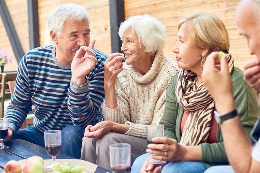 Group of aged friends spending pleasant time together Group of aged friends spending pleasant time together