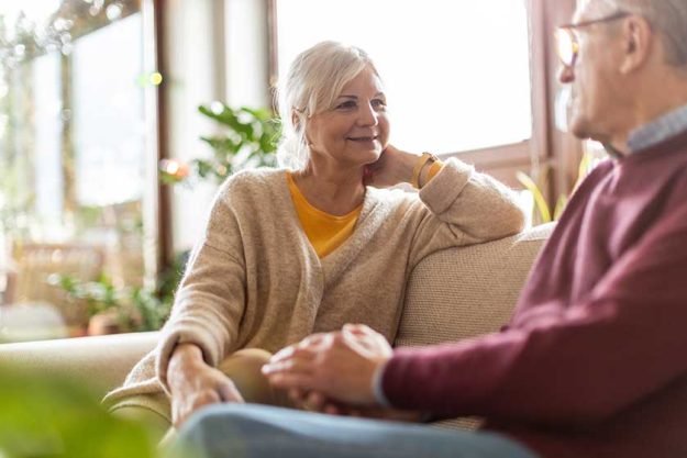 Portrait Happy Elderly Couple Relaxing Together Sofa Portrait Happy Elderly Couple Relaxing Together Sofa