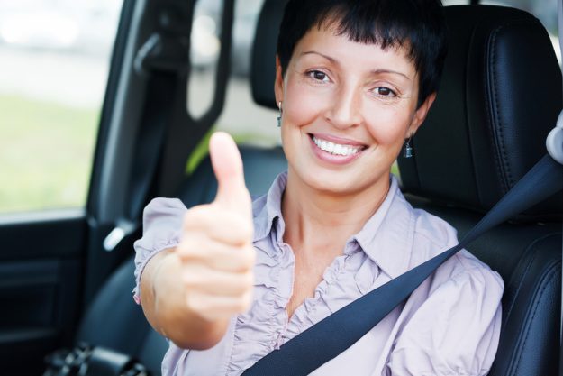 Smiling senior woman in a car How Transportation Service In A Senior Living Home In Glenpool, OK Makes Your Active Retirement Dream Come True