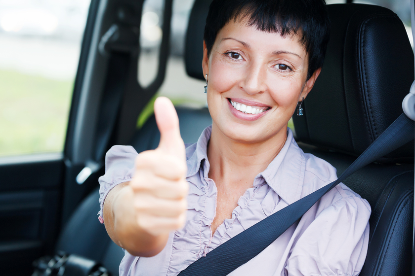 Smiling senior woman in a car How Transportation Service In A Senior Living Home In Glenpool, OK Makes Your Active Retirement Dream Come True