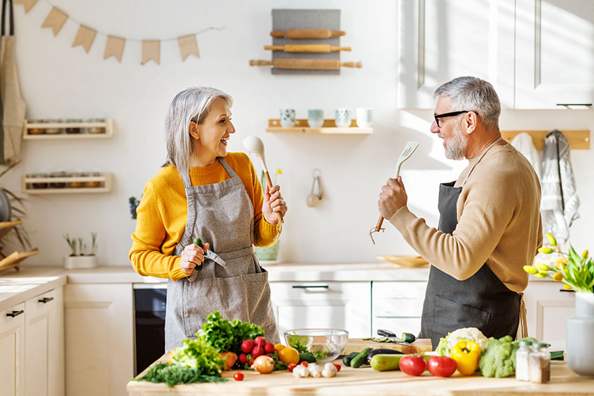 Joyful elderly couple have fun