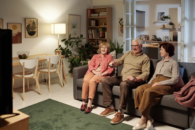 three-aged-friends-casualwear-sitting-sofa three-aged-friends-casualwear-sitting-sofa