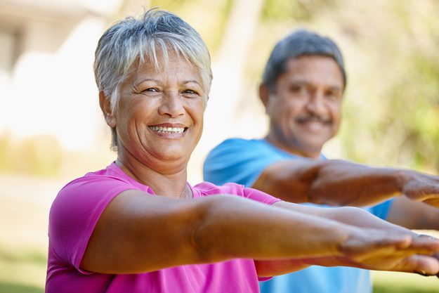 Portrait of a mature couple exercising together Portrait of a mature couple exercising together