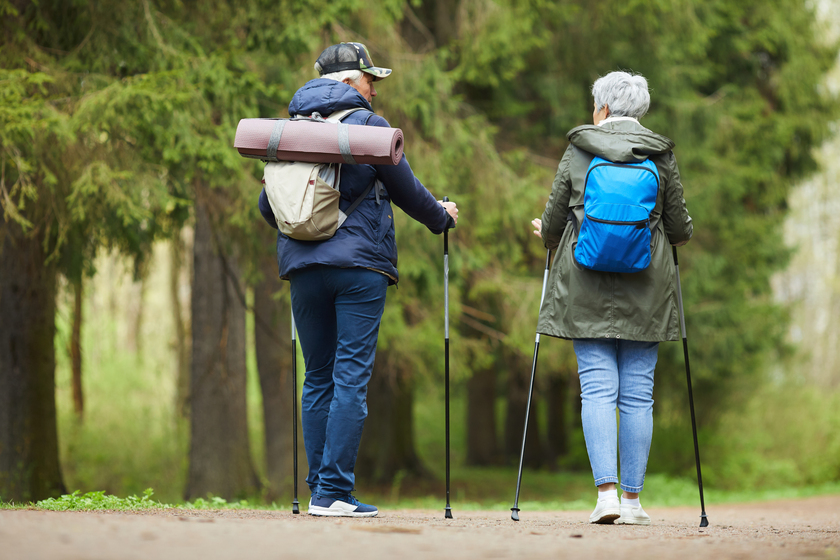 Active Senior Couple Enjoying Walk in Forest
