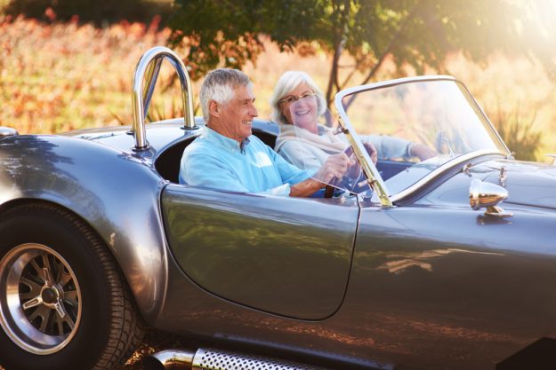 Taking a drive through the countryside. Cropped shot of a senior couple driving through the countryside. Taking a drive through the countryside. Cropped shot of a senior couple driving through the countryside.