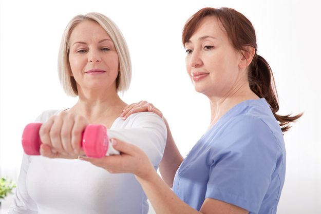 Picture of middle aged woman during rehabilitation