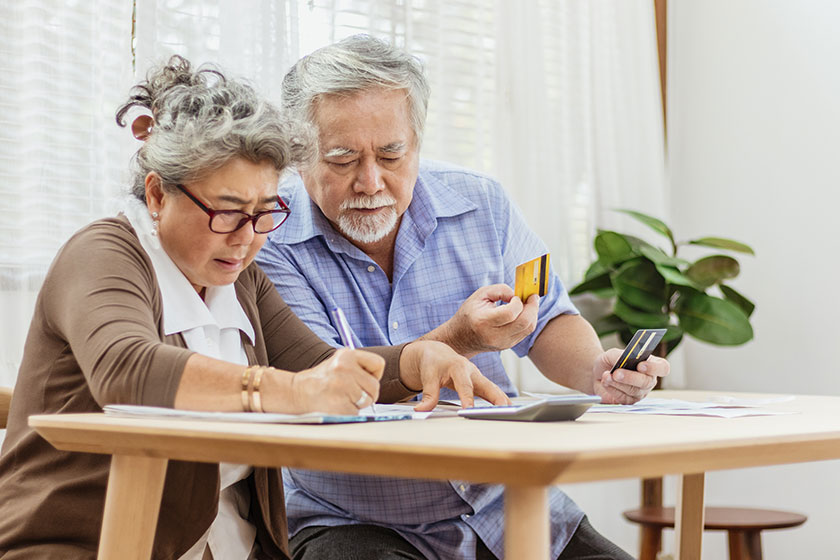 Stressed senior elderly couple conflict of credit card
