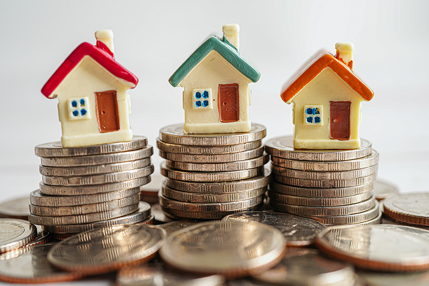 House on stack of coins
