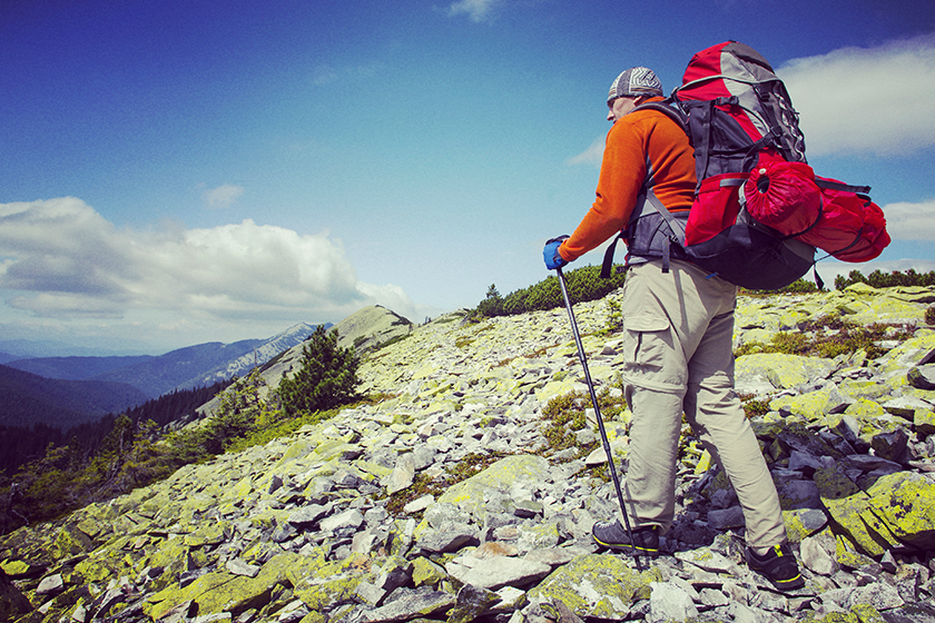 Man tourist walking the mountains