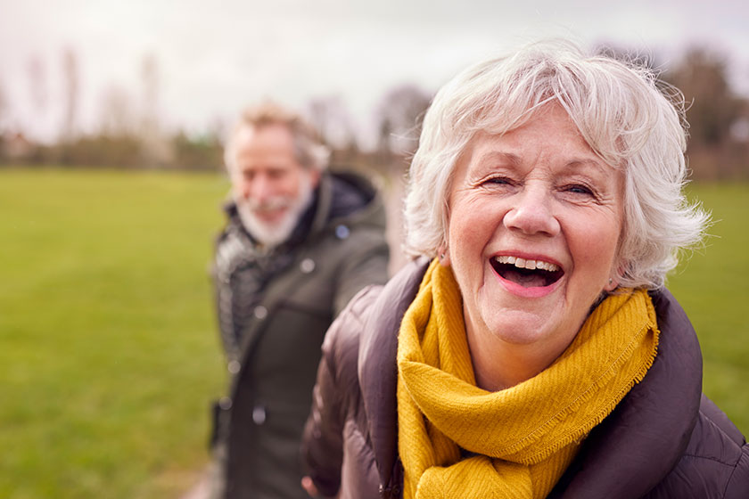 Portrait Of Loving Senior Couple Enjoying Autumn  winter work park together Portrait Of Loving Senior Couple Enjoying Autumn winter work park together