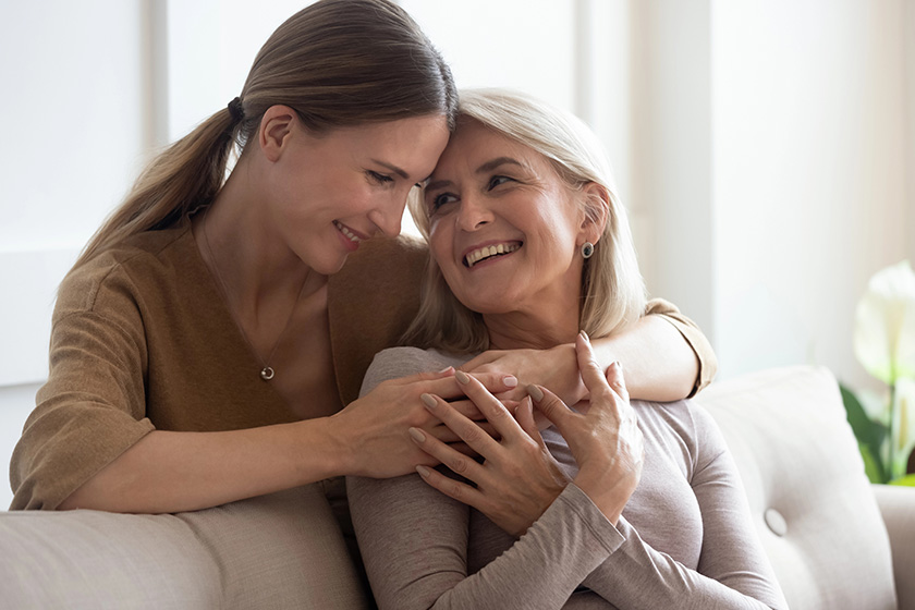 Head-shot-happy-adult-young-woman-embracing-smiling. Head-shot-happy-adult-young-woman-embracing-smiling.