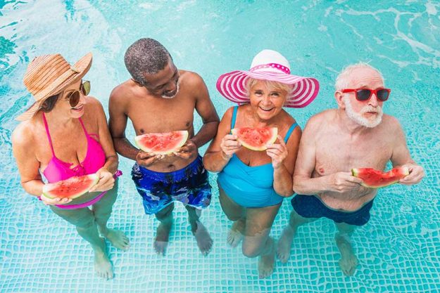 Happy-seniors-having-party-swimming-pool-elderly-friends-pool-party Happy-seniors-having-party-swimming-pool-elderly-friends-pool-party