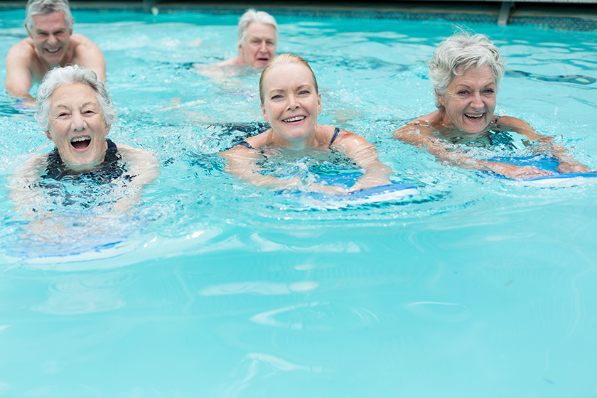senior-swimmers-enjoying-in-pool senior-swimmers-enjoying-in-pool