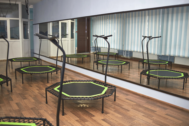 Empty mini trampoline against mirror